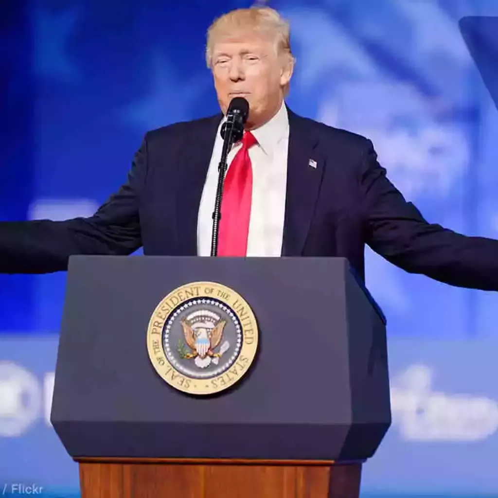 A bustling 19th-century American town square with Donald Trump standing on a podium.